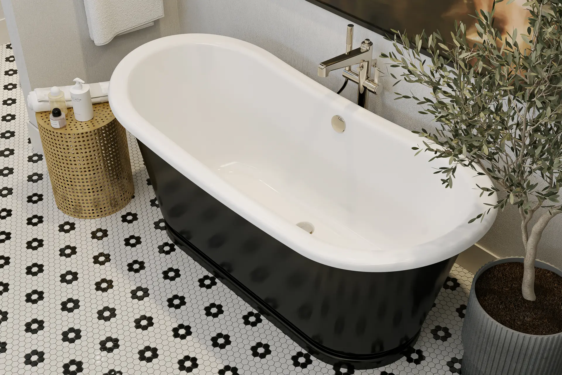 Black freestanding tub with a Crosswater Darby floor-mount filler on a black and white flower-pattern mosaic floor.