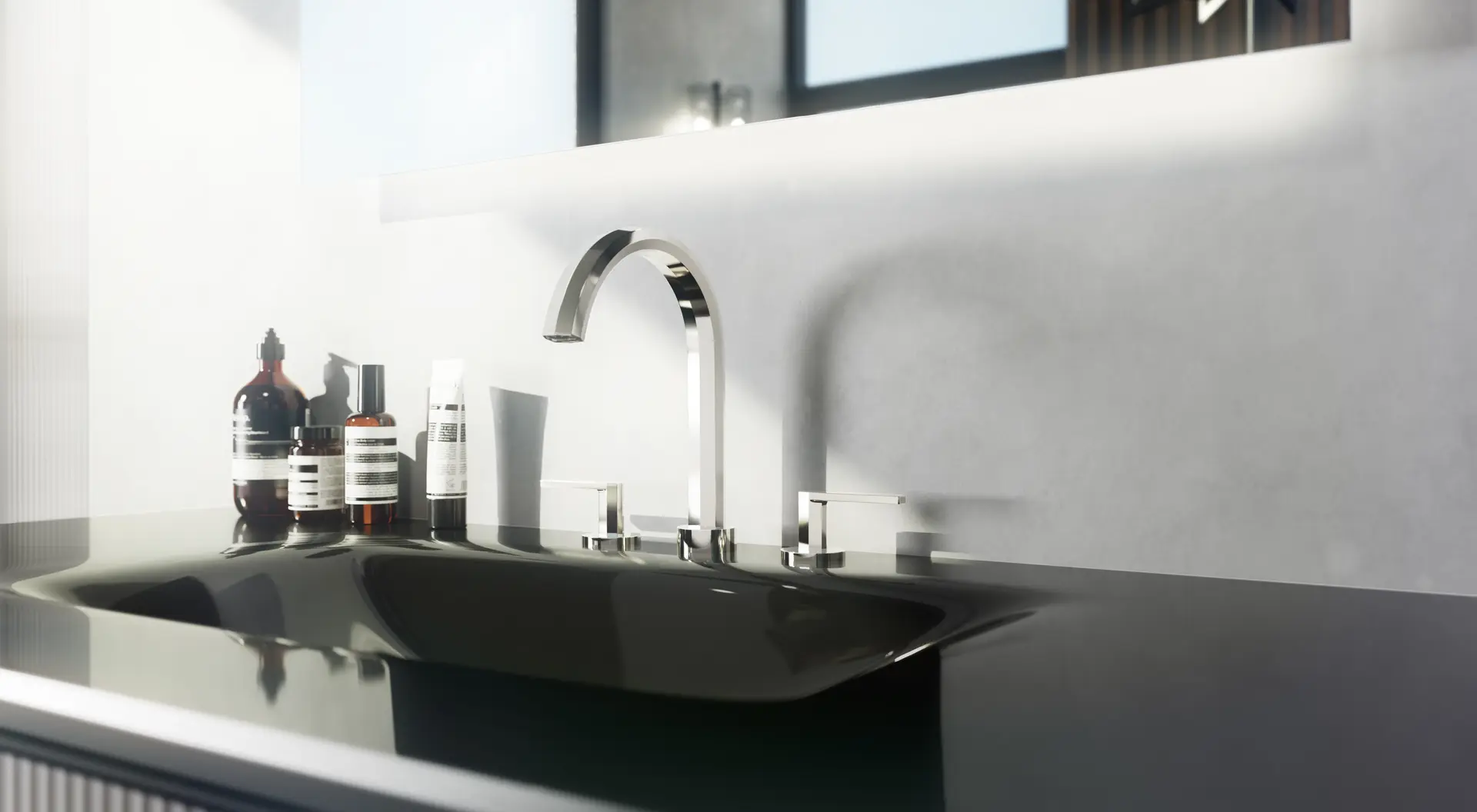 Crosswater Heir single-hole basin faucet over a black glass sink with grooming bottles on the ledge.
