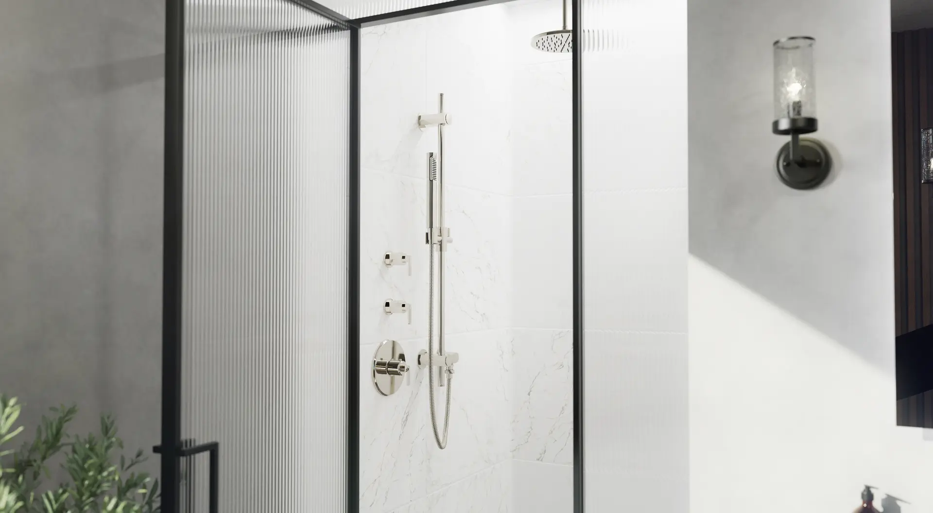 Crosswater Heir shower with a slide-bar handshower and thermostatic trim on white marble behind black-framed glass.