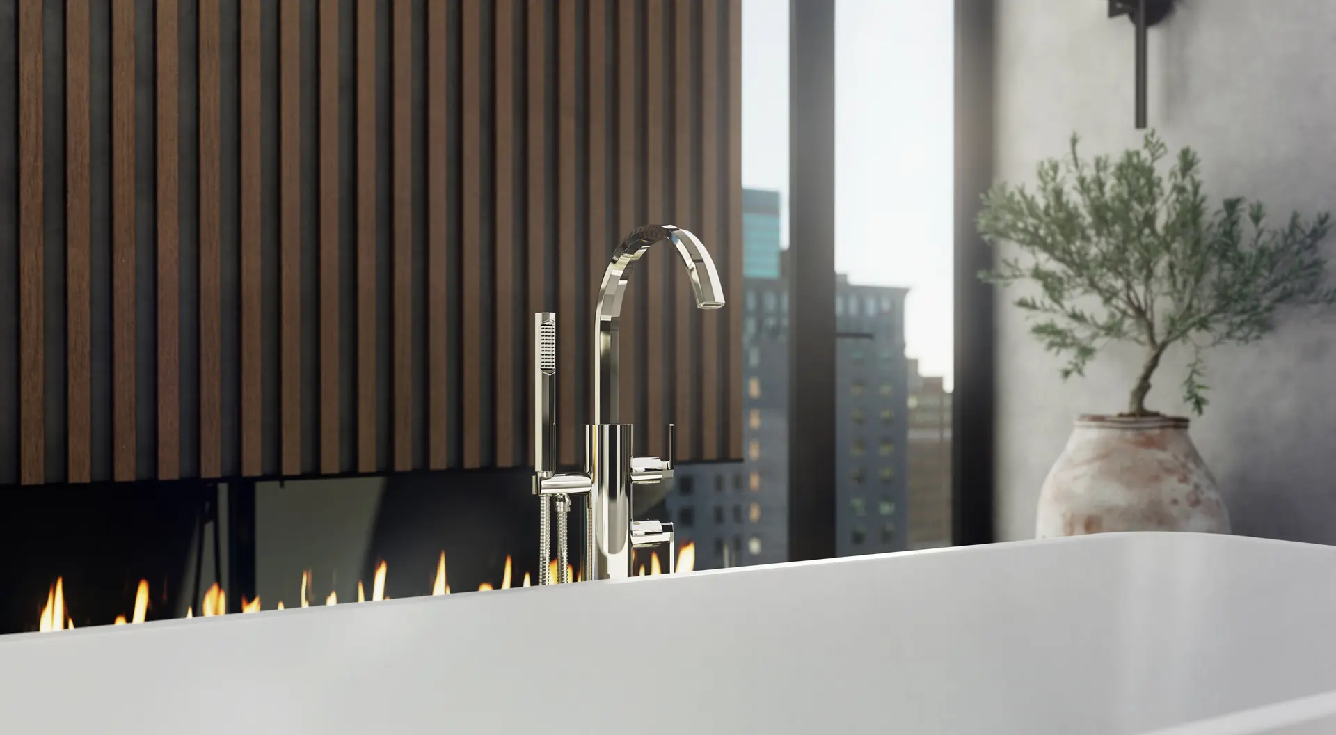 Crosswater Heir floor-mount tub filler beside a freestanding tub, with a fireplace and city view behind.