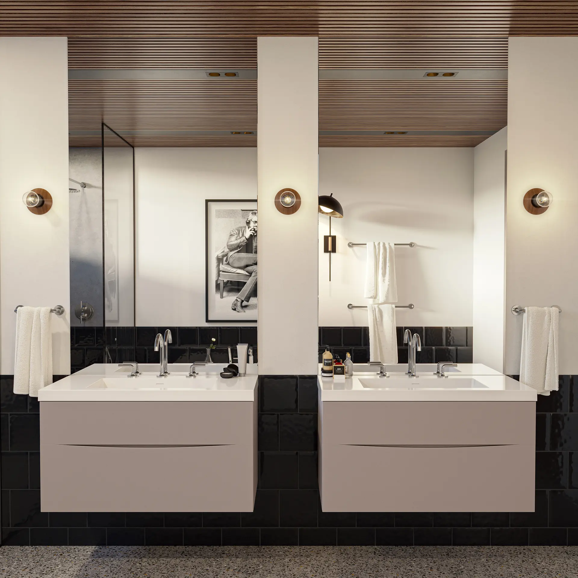 Crosswater Taos double floating vanities with widespread faucets and brass wall sconces.