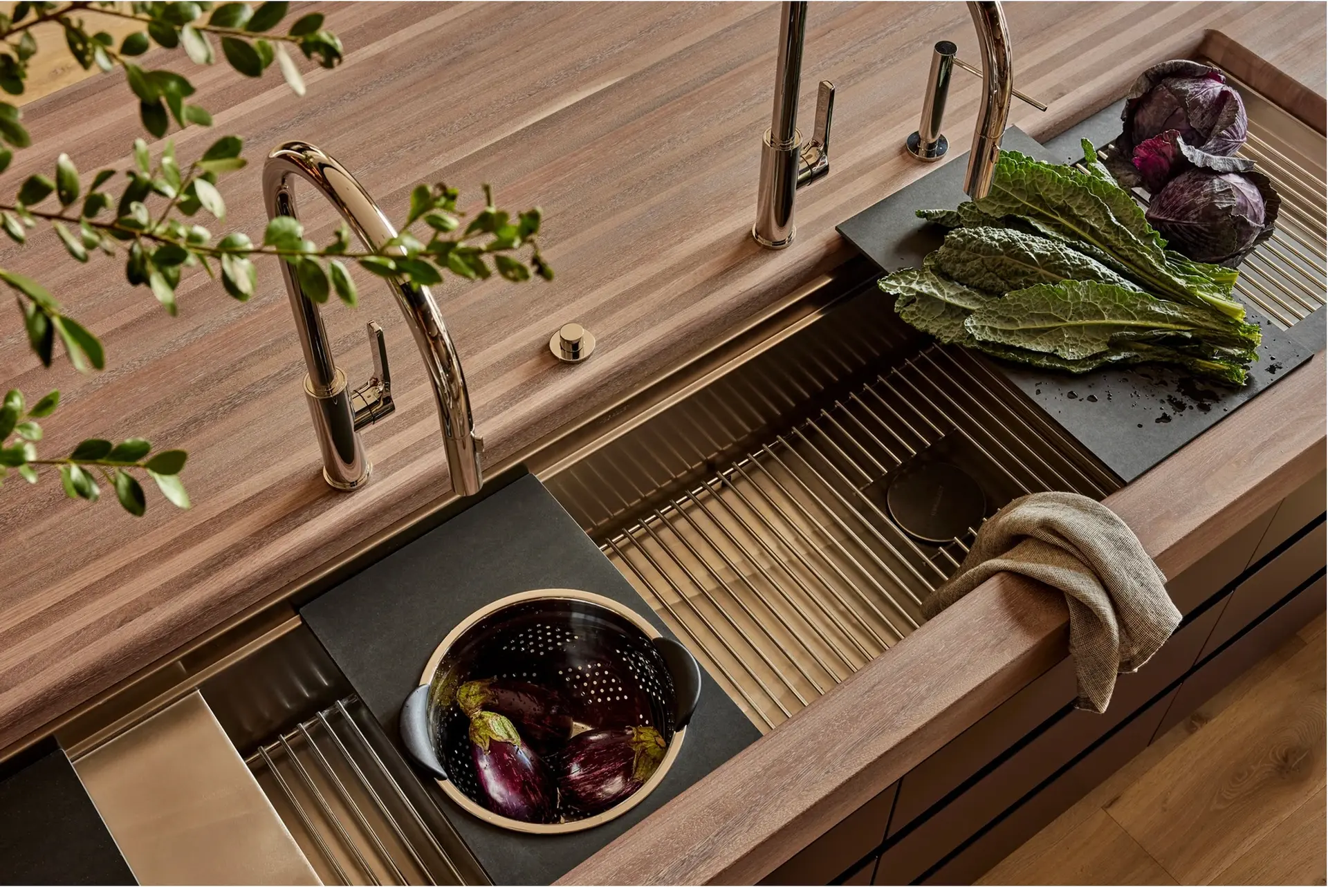 The Galley Workstation sink and accessories in a kitchen.